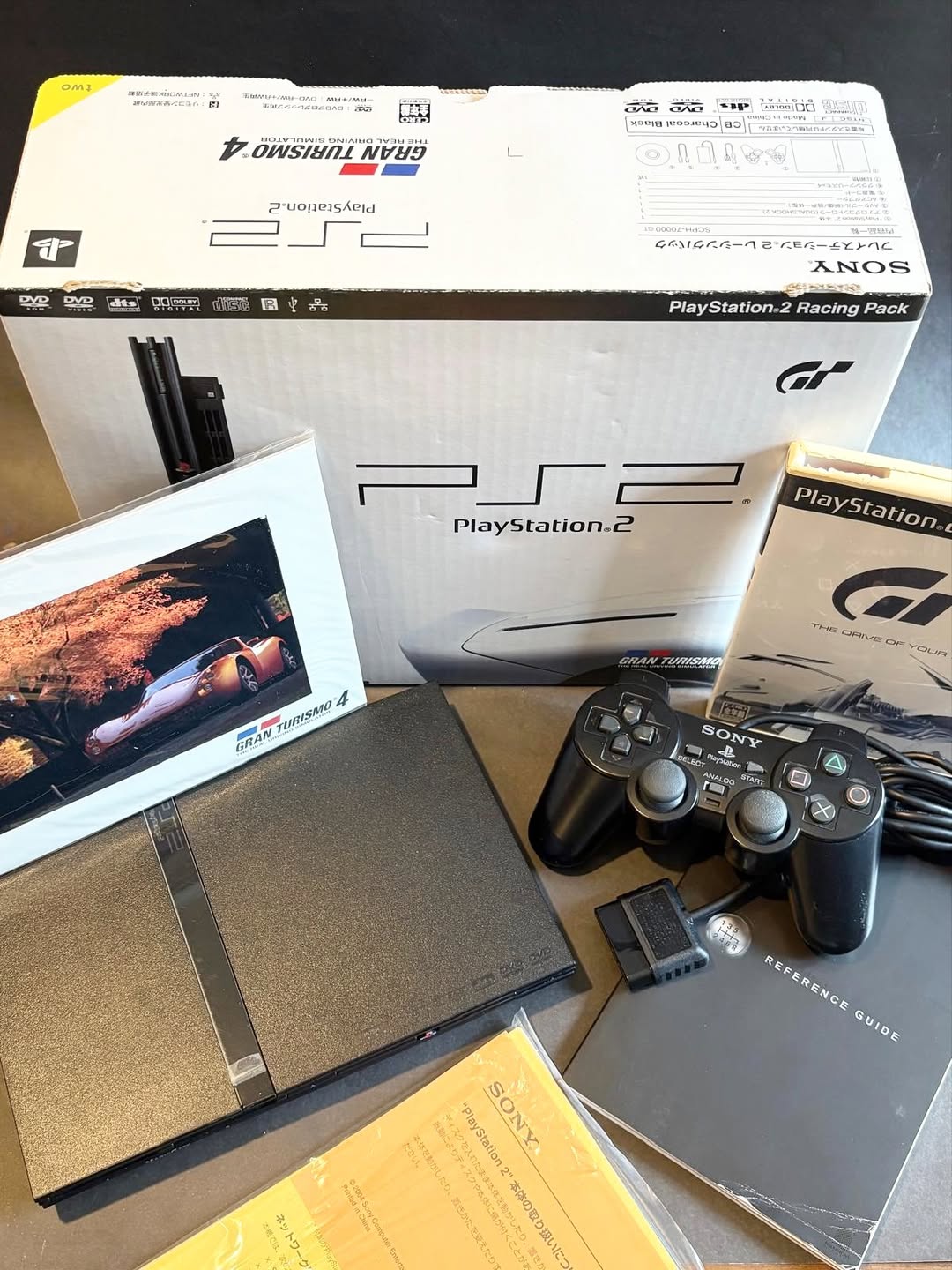ps2sjpgt-1 PlayStation 2 Slim Gran Turismo 4 Racing Pack SCPH-70000GT Japonesa - Imagen 1